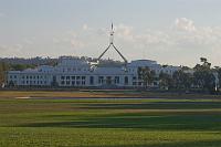  Old Parliament House with the flag pole of new Parliament House behind it